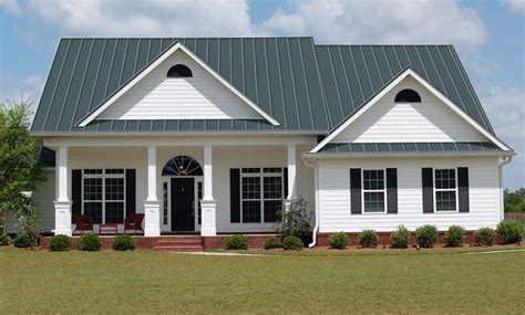 blue house and charcoal grey metal roof|black metal roof colors.